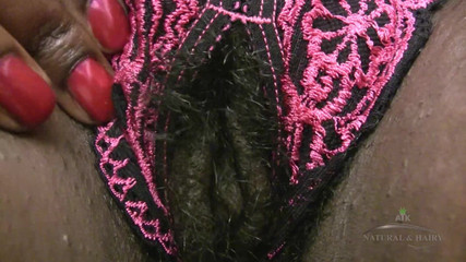 Hairy and black Chocolate changes her lingerie