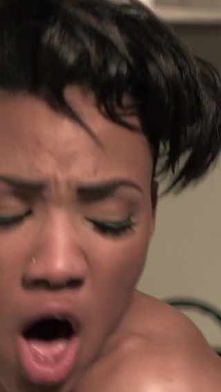 Hot ebony slut takes a white dick inside of her