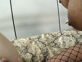 Ebony chick in fishnet loves eating white pussy