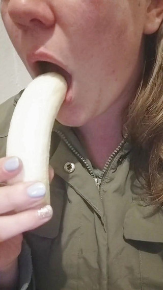 Banana sucking close up